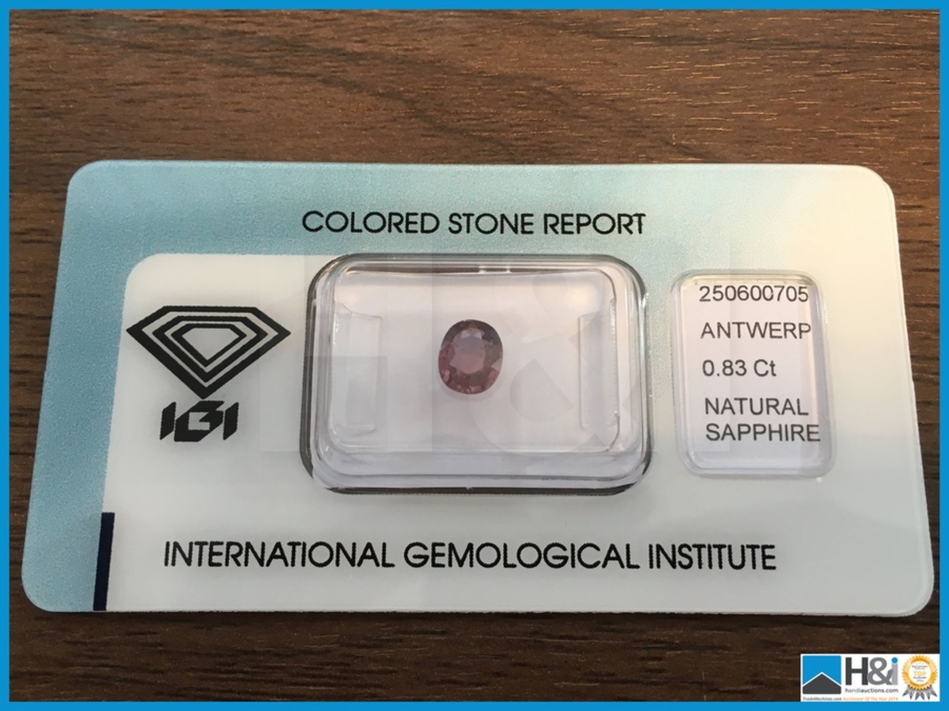 0.83ct Natural Colour Change Sapphire, Daylight, Orangy Pinkish, Artificial Light, Purple. Oval