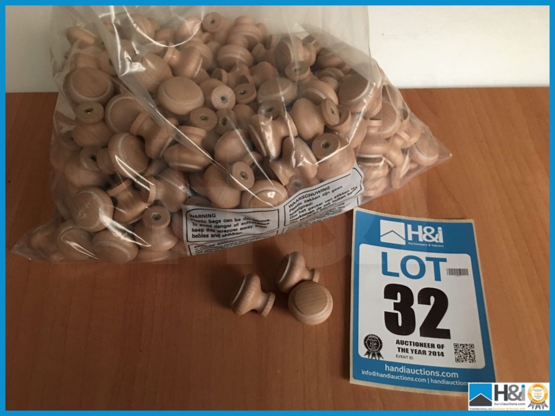 200 off new and unused high quality wooden beech drawer / cupboard knobs Appraisal: Viewing