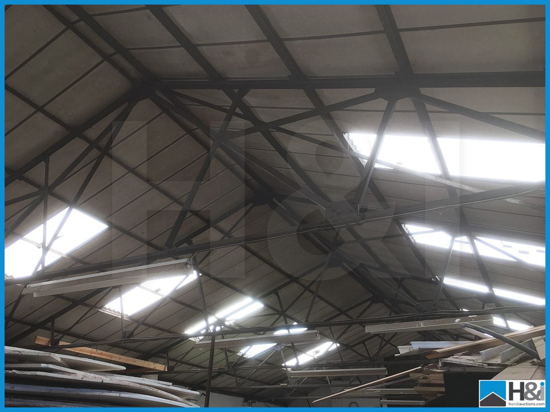 Complete building roof assembly comprising trusses and angle iron pearlings. 6 off trusses, 7 bays