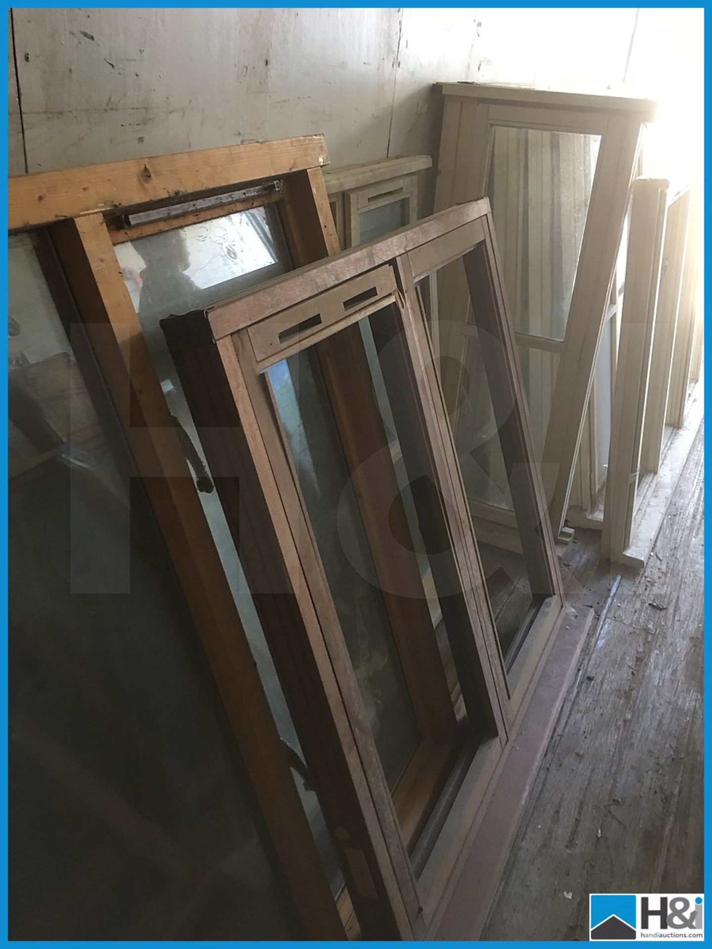 Huge quantity of unused wooden, glazed and unglazed window frames. Dusty appearance due to storage - Image 8 of 10