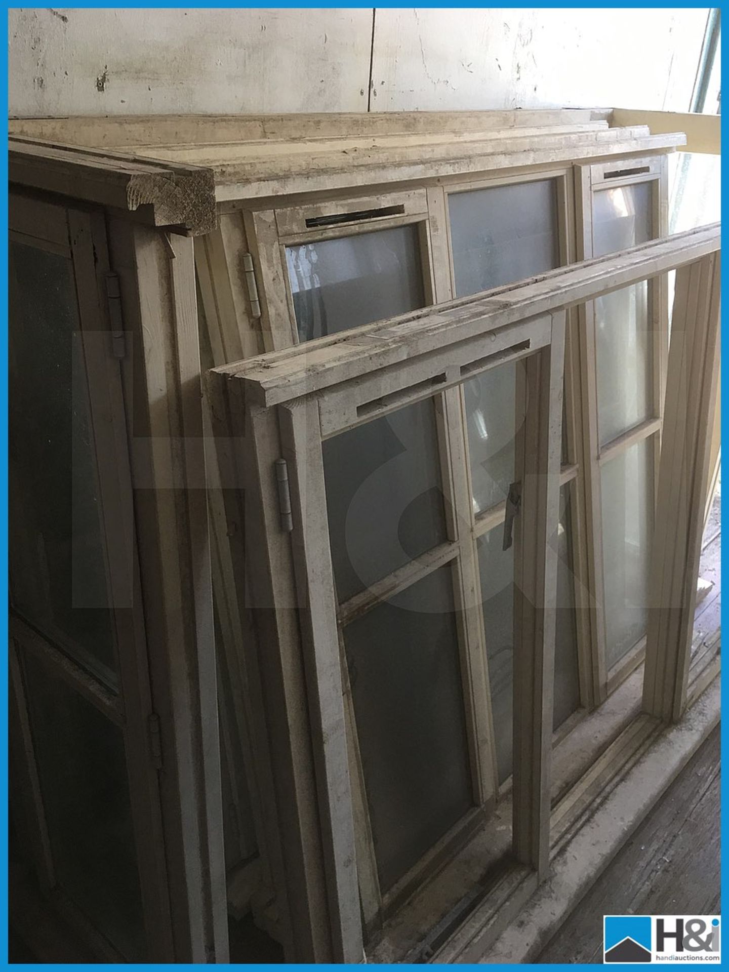 Huge quantity of unused wooden, glazed and unglazed window frames. Dusty appearance due to storage - Image 9 of 10