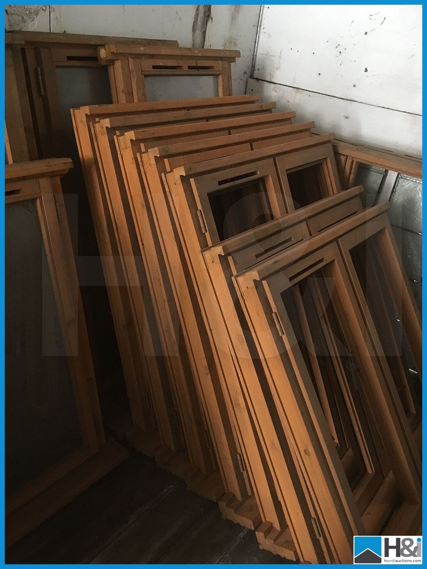 Huge quantity of unused wooden, glazed and unglazed window frames. Dusty appearance due to storage - Image 6 of 10