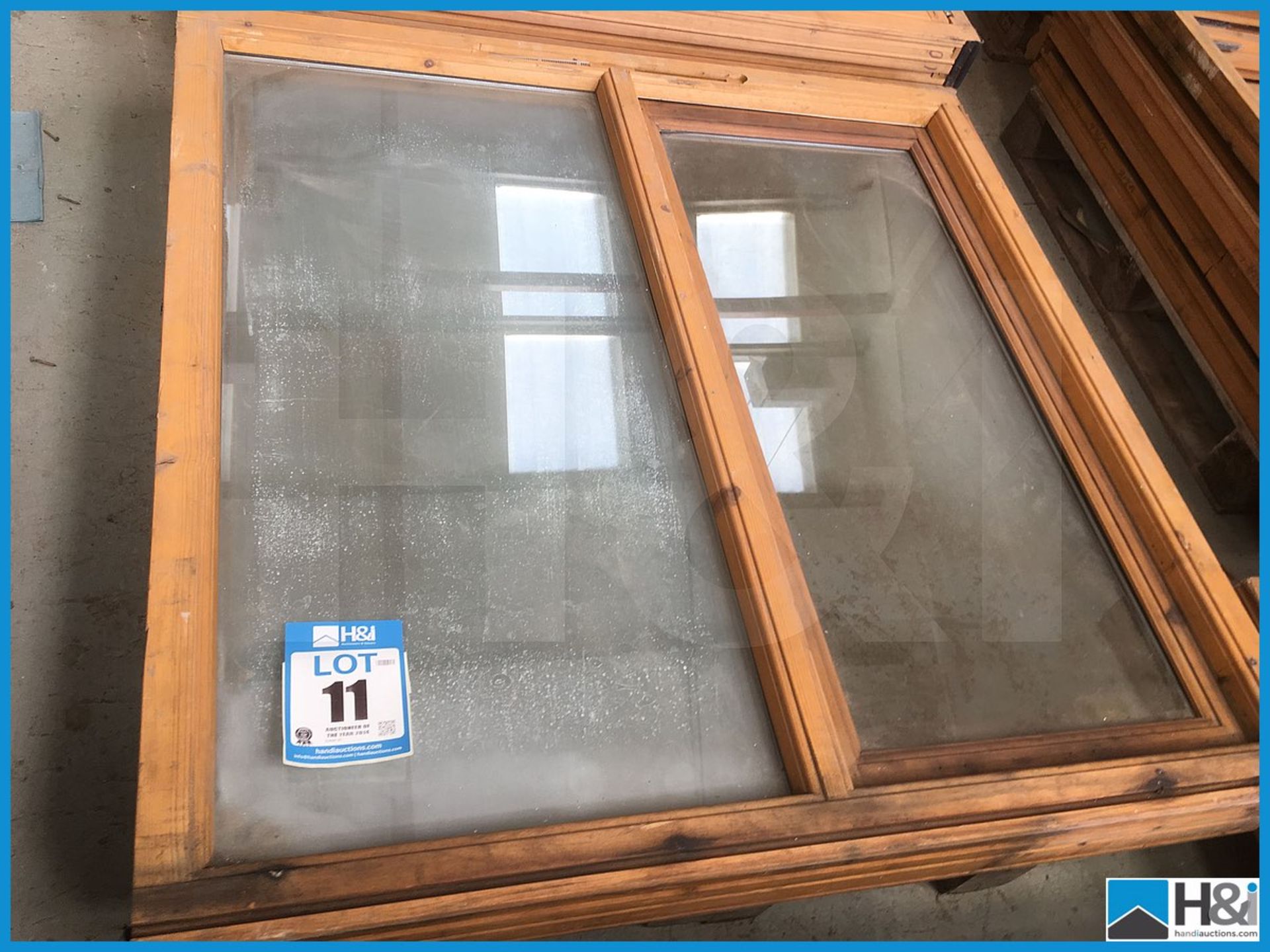 1 off unused wood glazed casememnt window approx 1040 x 1200. Dusty appearance due to storage