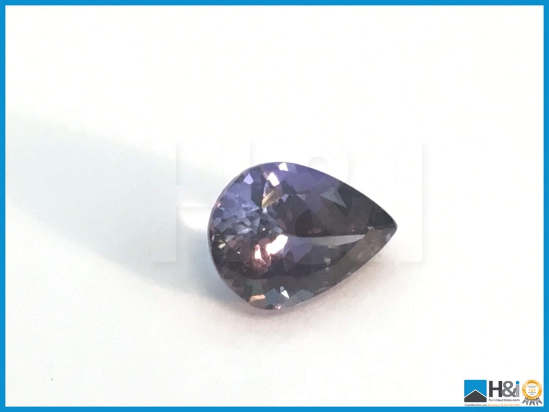 3.28ct Natural Tanzanite. Pear fancy cut in intense bluish violet. Transparent with IGI Certificate.