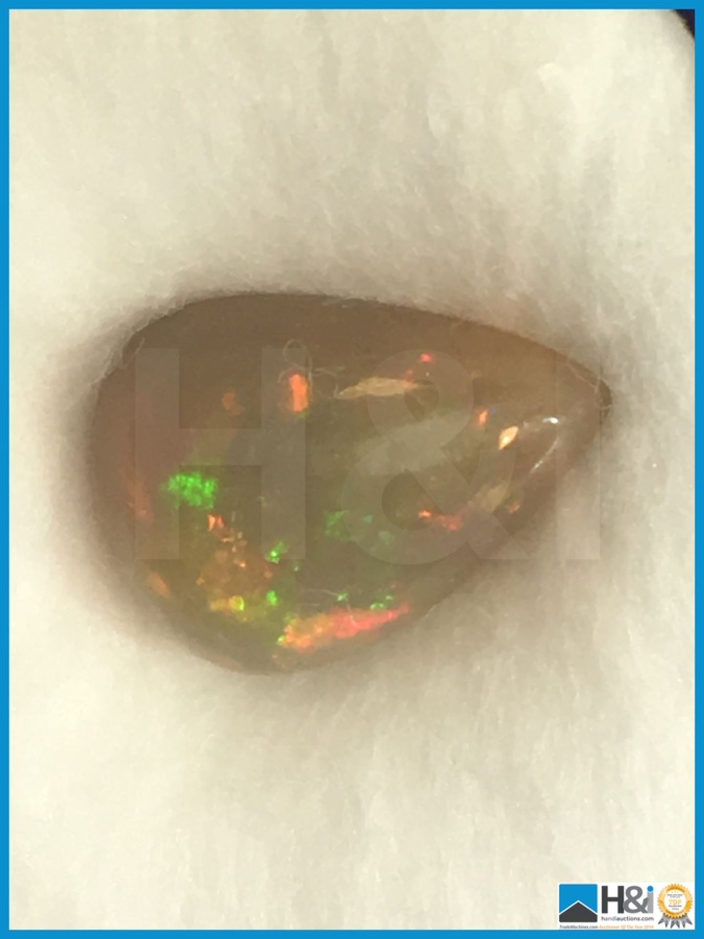 2.40ct Natural Opal. Pear Cabochon in white with play of colours. Size: 12.28x8.91x4.63mm. - Bild 2 aus 4