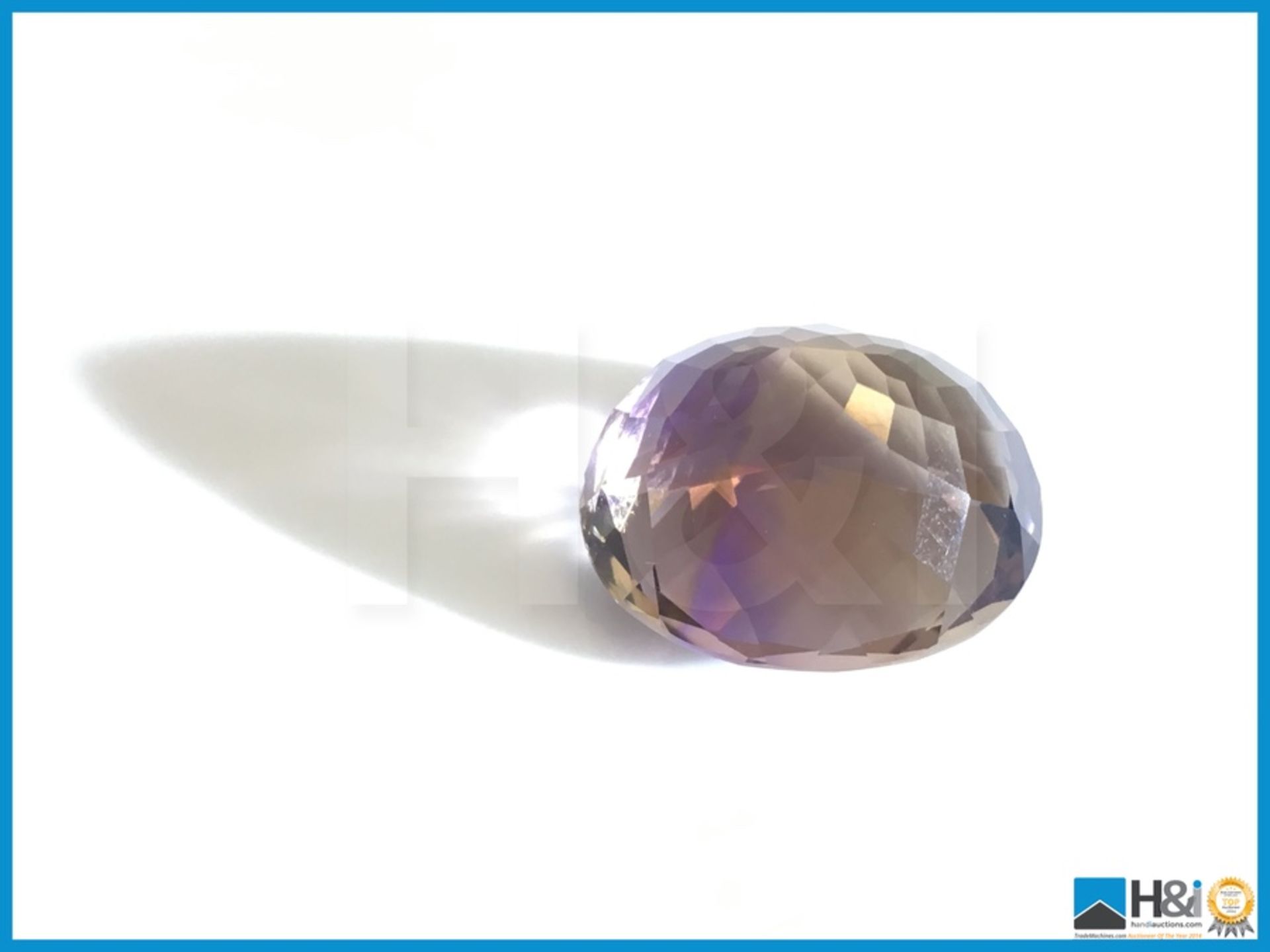 22.04ct Natural Quartz (Ametrine). Oval Facetted Cut in Purple/Yellow. Transparent with GIL