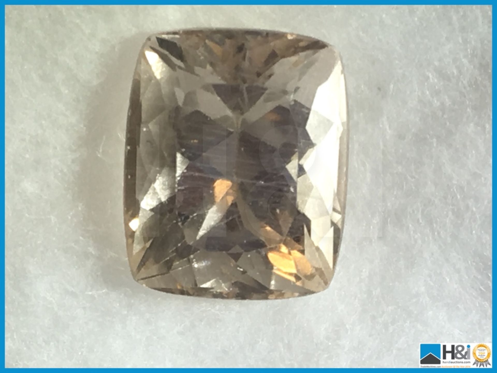 7.09ct Natural Topaz. Pinkish Orange Cushion Cut. Transparent 11.87x9.77x7.32mm. Certification: