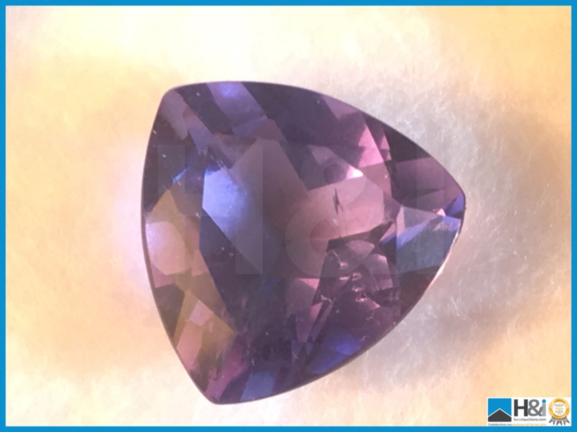 10.00ct Natural Fluorite. Trillion Cut in Blue. Size: 14.04x13.89x8.72mm. Certification: GIL