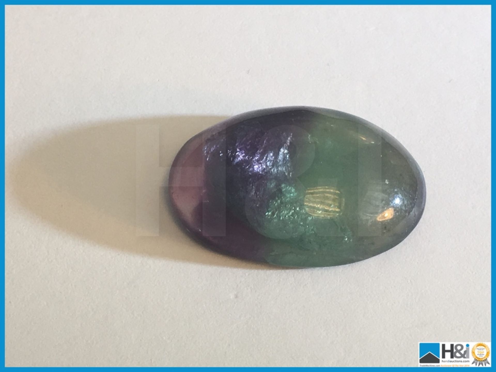 31.40ct Earth Mined Fluorite Brazilian Gemstone. Oval cut in Greenish purple colour, Very pretty. - Image 2 of 4