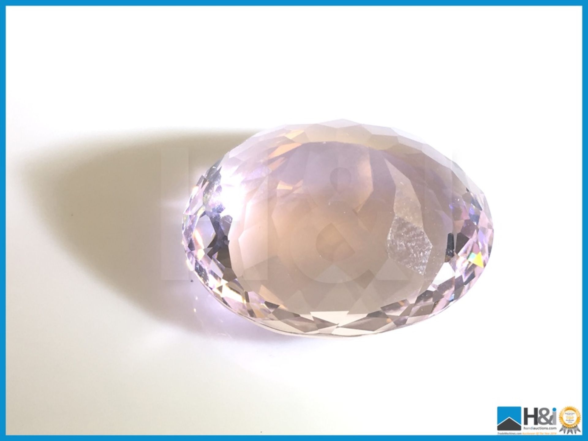 27.44ct Natural Pink Kunzite. Oval Facetted Cut, Transparent 22x19x12mm. Certification: None - Image 2 of 3