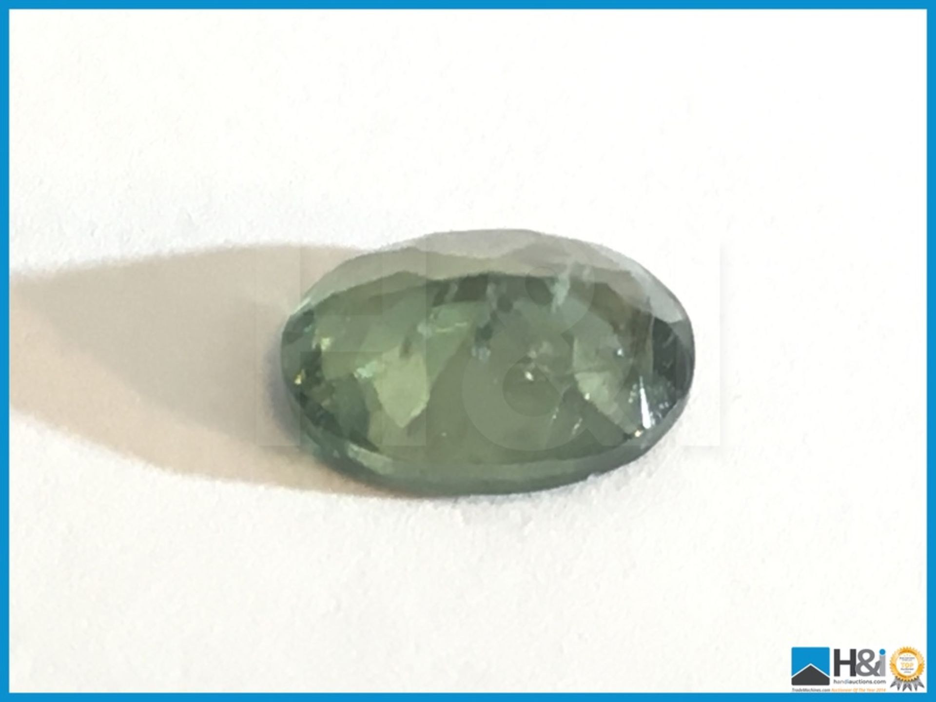 1.28ct Natural Apatite, Oval cut in Green. Size: 8.12x6.02x3.65mm. Certification: None Appraisal: - Image 2 of 4