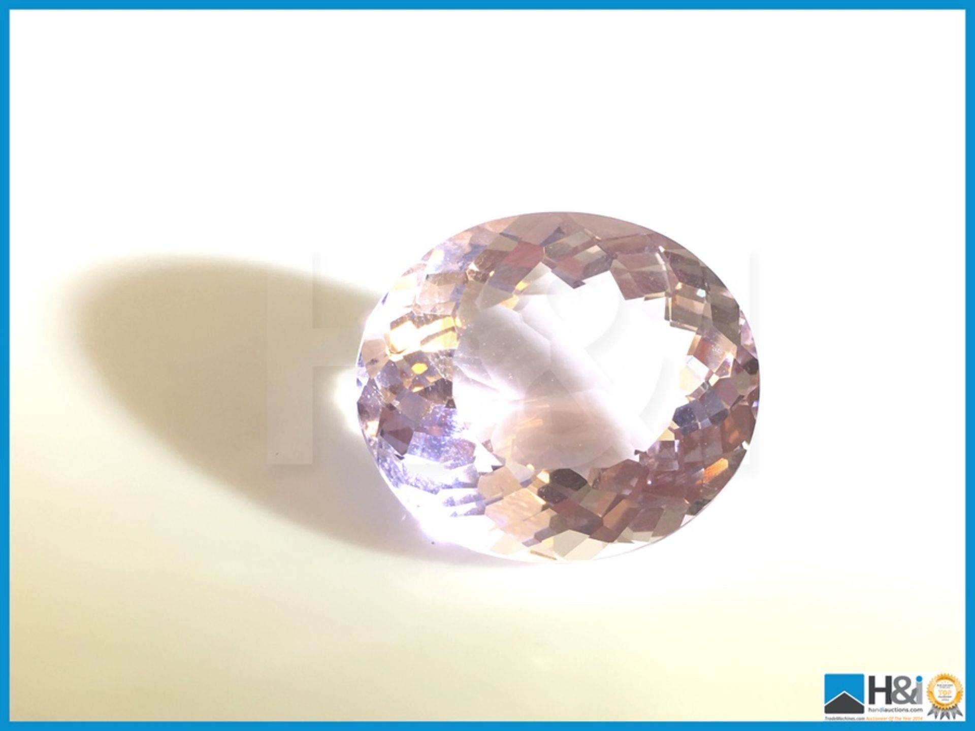 27.44ct Natural Pink Kunzite. Oval Facetted Cut, Transparent 22x19x12mm. Certification: None