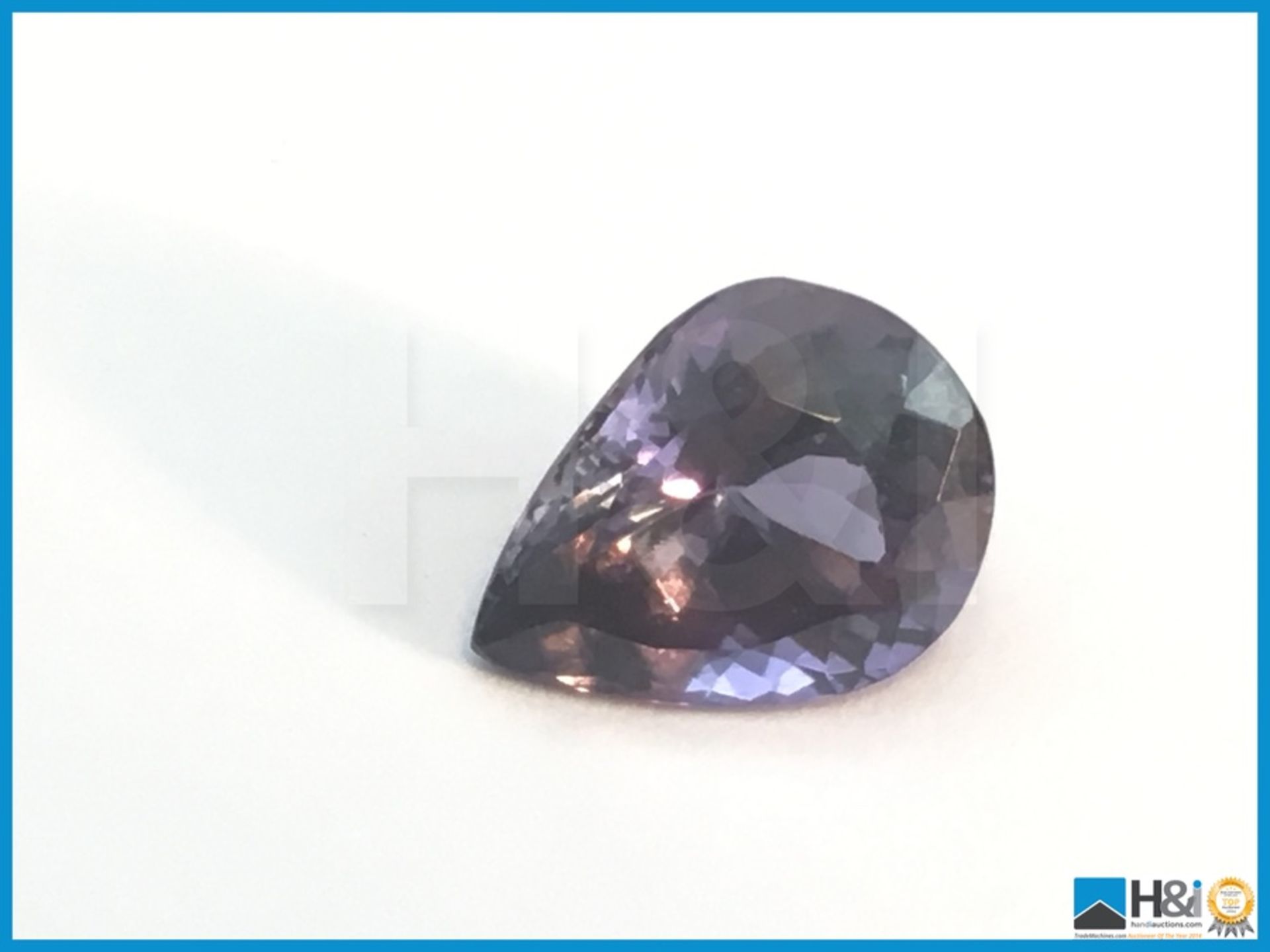 3.28ct Natural Tanzanite. Pear fancy cut in intense bluish violet. Transparent with IGI Certificate. - Bild 2 aus 4