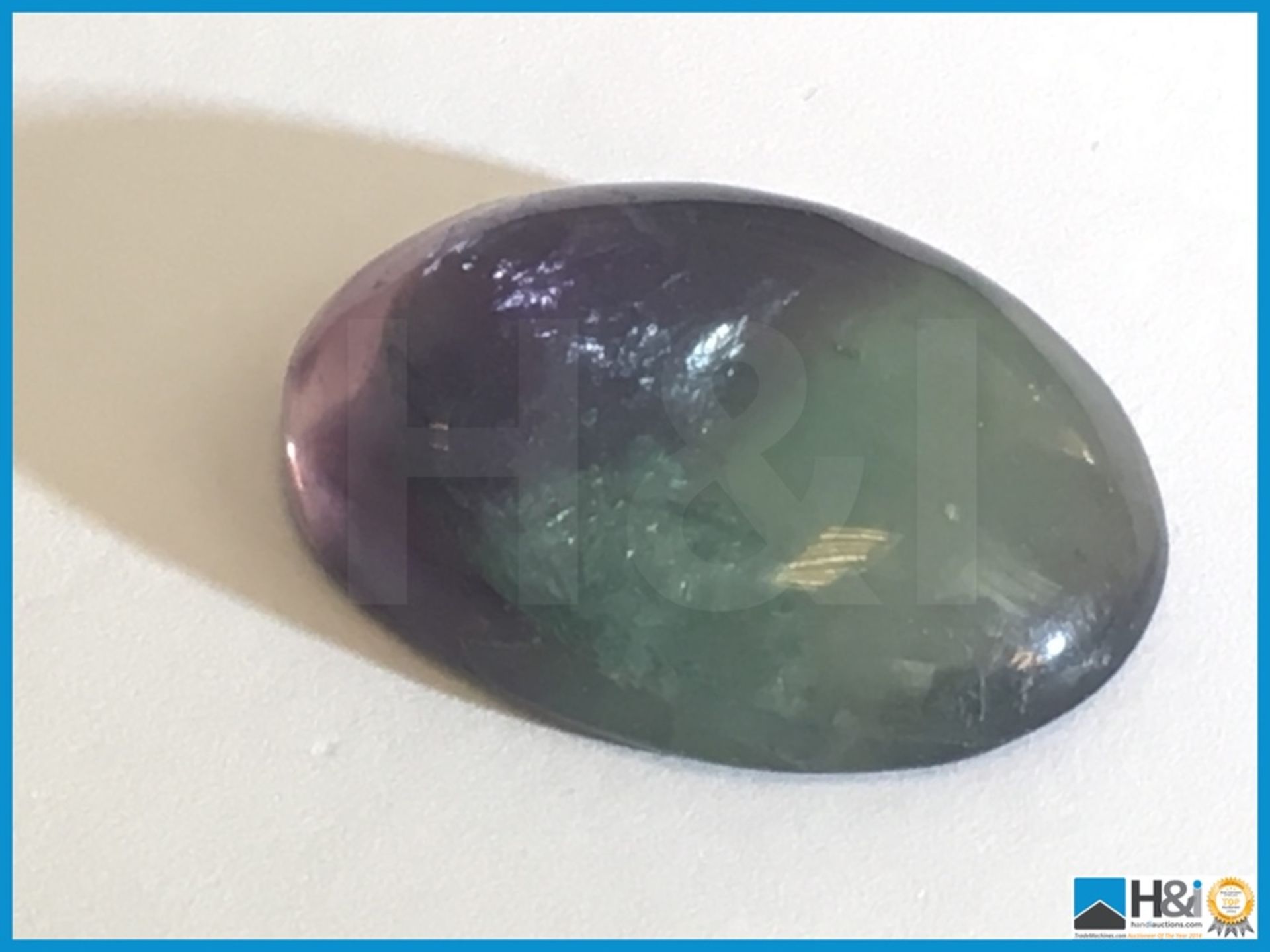 31.40ct Earth Mined Fluorite Brazilian Gemstone. Oval cut in Greenish purple colour, Very pretty. - Image 3 of 4