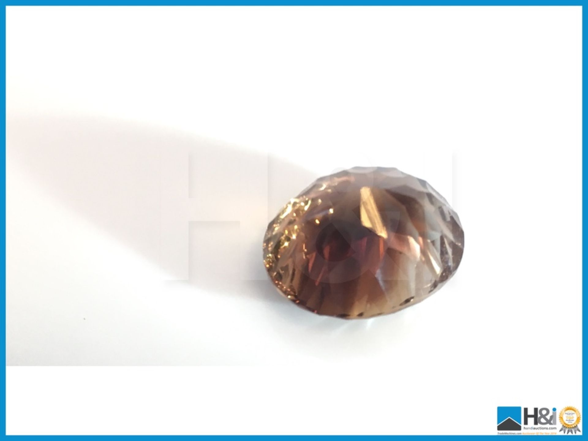 13.56ct Natural Topaz.Oval Facetted Cut in Yellowish Brown. Transparrent with GIL Certificate 14. - Bild 2 aus 4