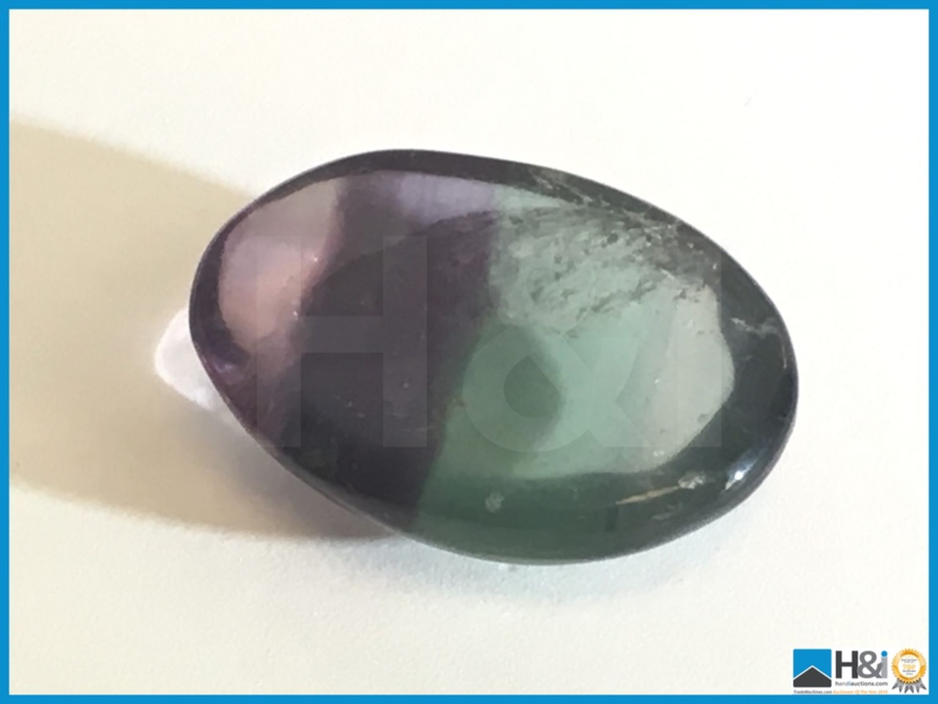 31.40ct Earth Mined Fluorite Brazilian Gemstone. Oval cut in Greenish purple colour, Very pretty. - Image 4 of 4