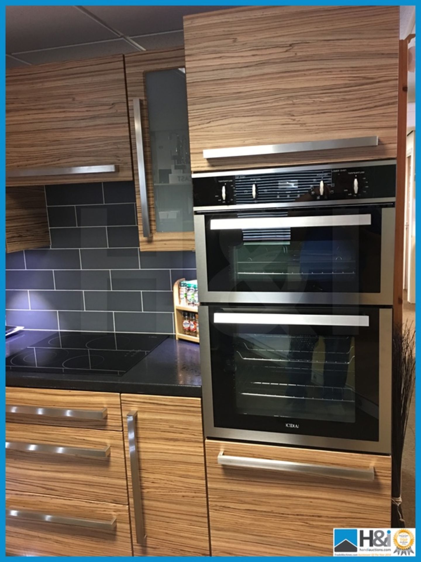 Stunning display kitchen finished in zebrano with black textured worktop, stainless steel 1.5 bowl - Image 4 of 19