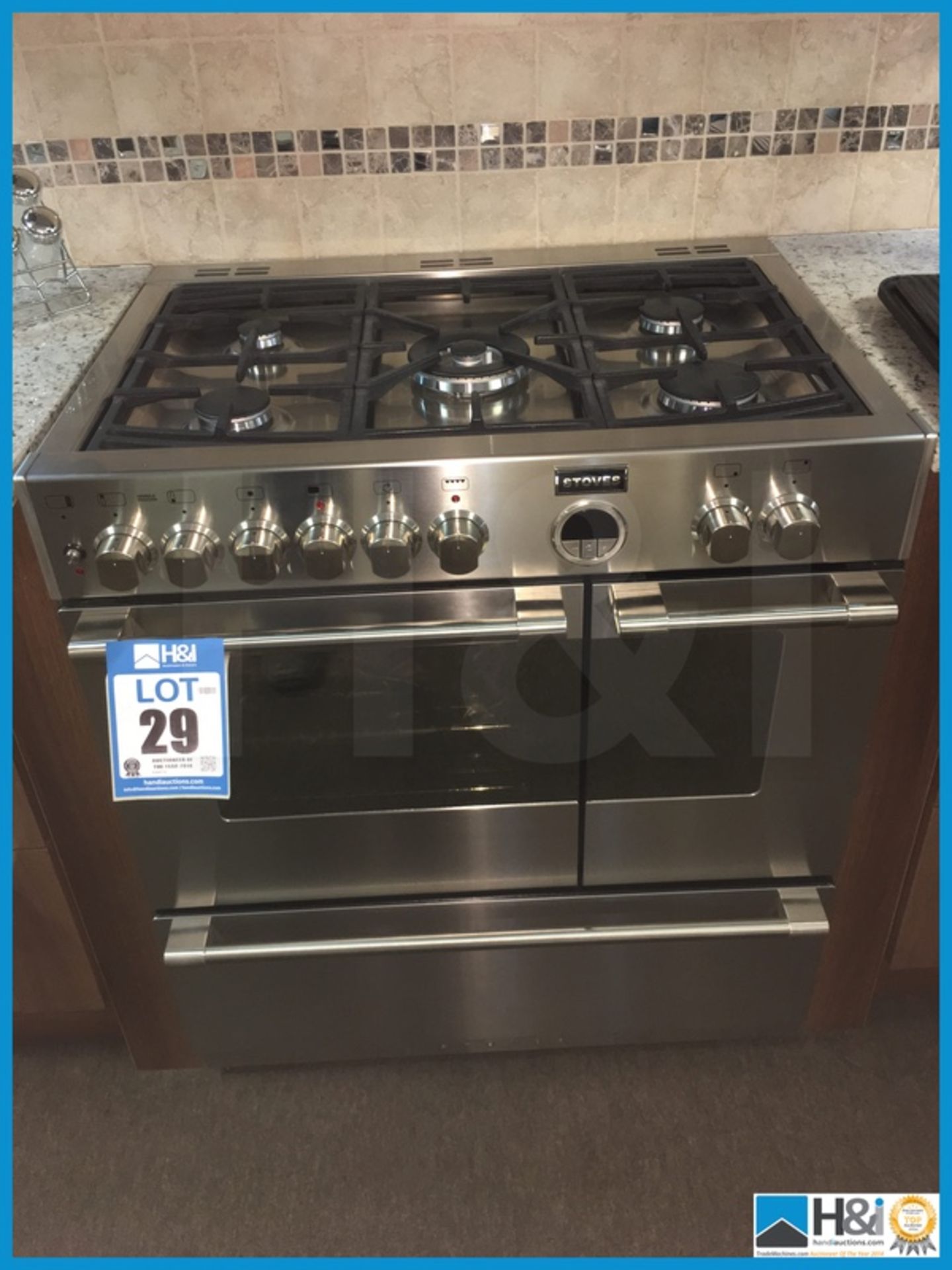 Stoves stainless steel double oven 800 wide with 5 gas burners and lower pan storage. Also