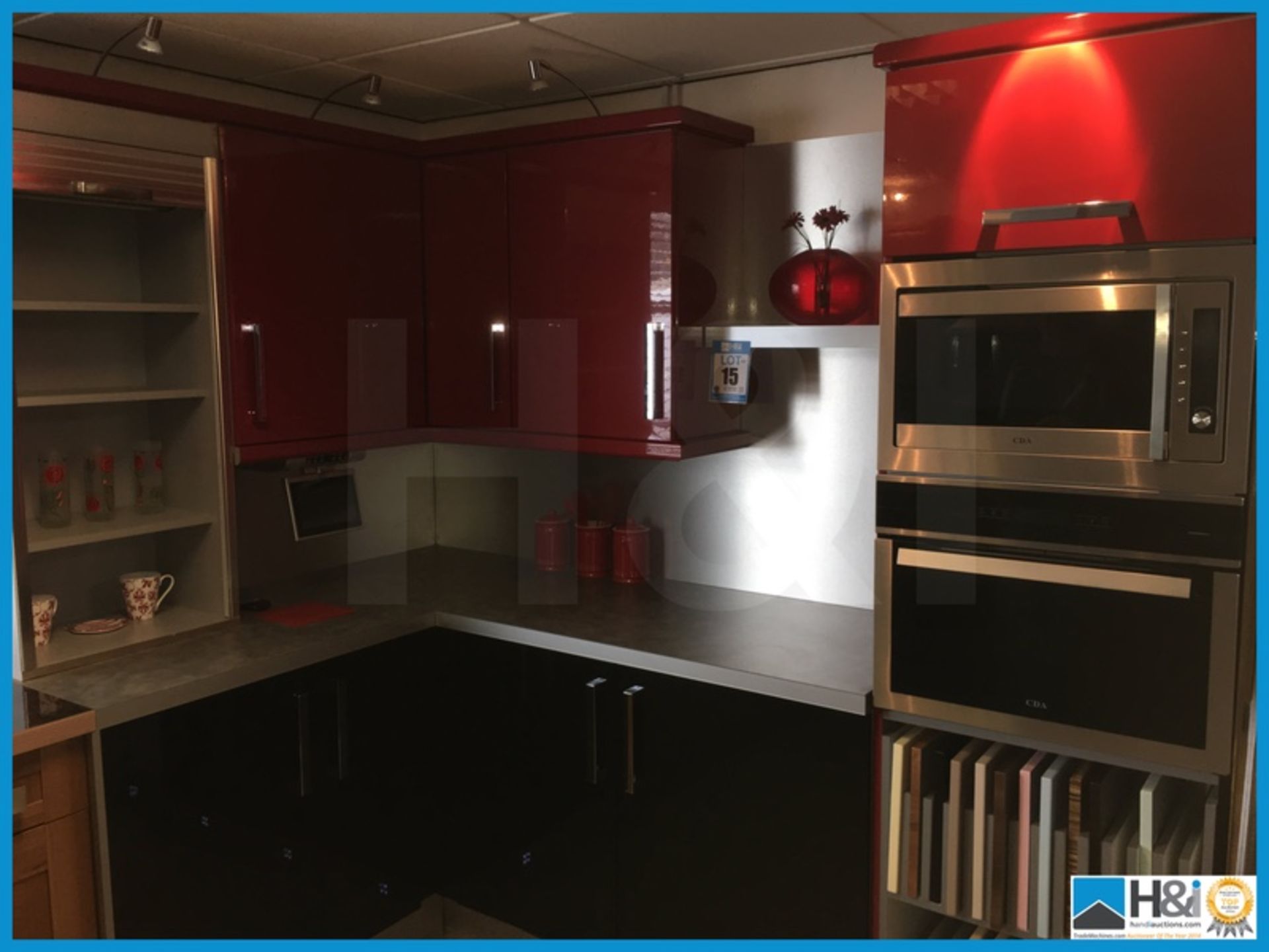 Red, silver and black display kitchen comprising tambour front storage unit, silver worktop and - Image 2 of 7