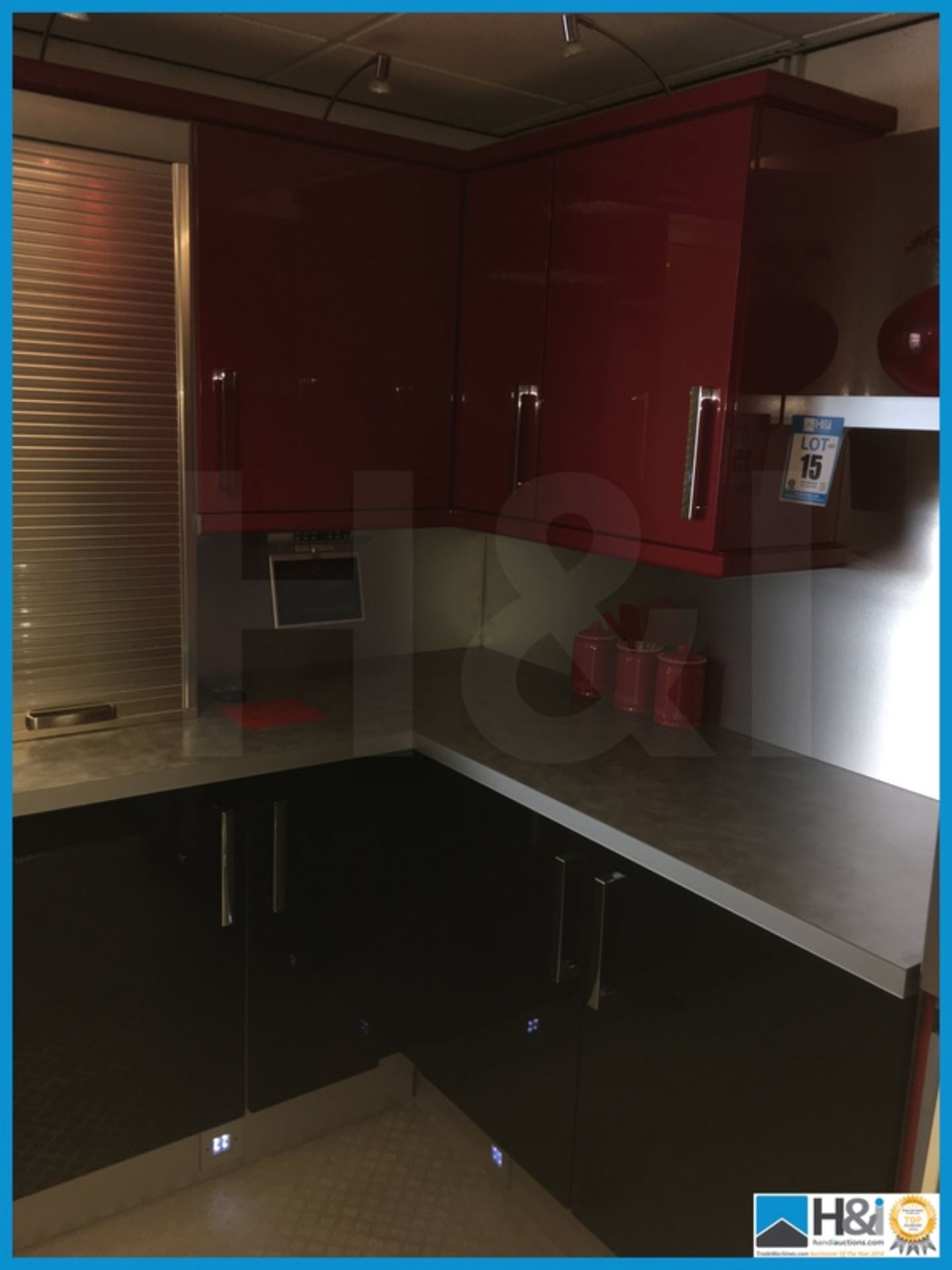 Red, silver and black display kitchen comprising tambour front storage unit, silver worktop and - Image 6 of 7