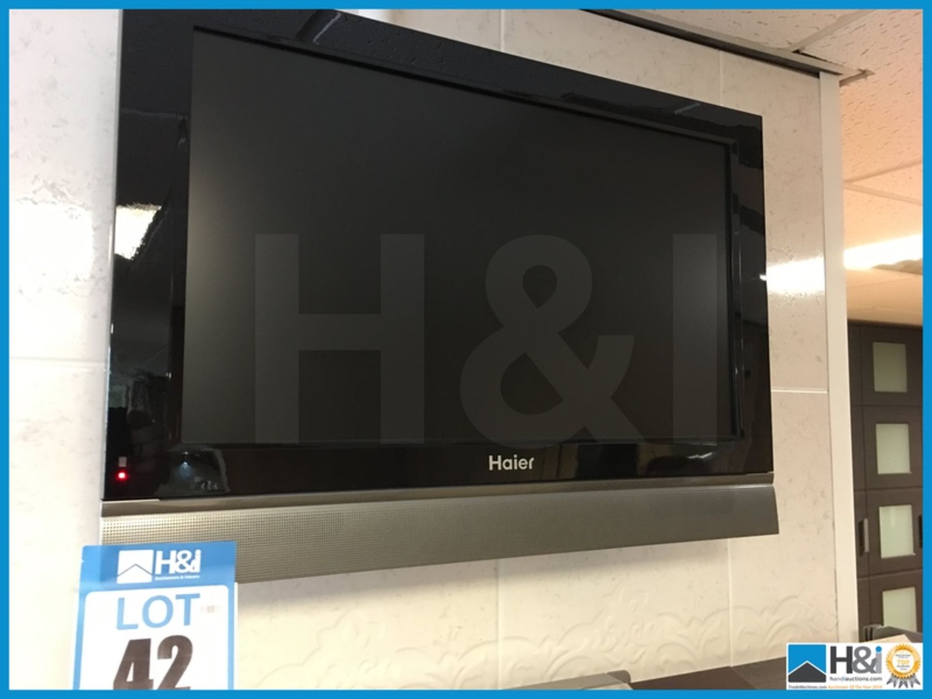 Haier 21in flat screen TV and wall bracket Appraisal: Excellent Serial No: NA Location: West - Image 2 of 3