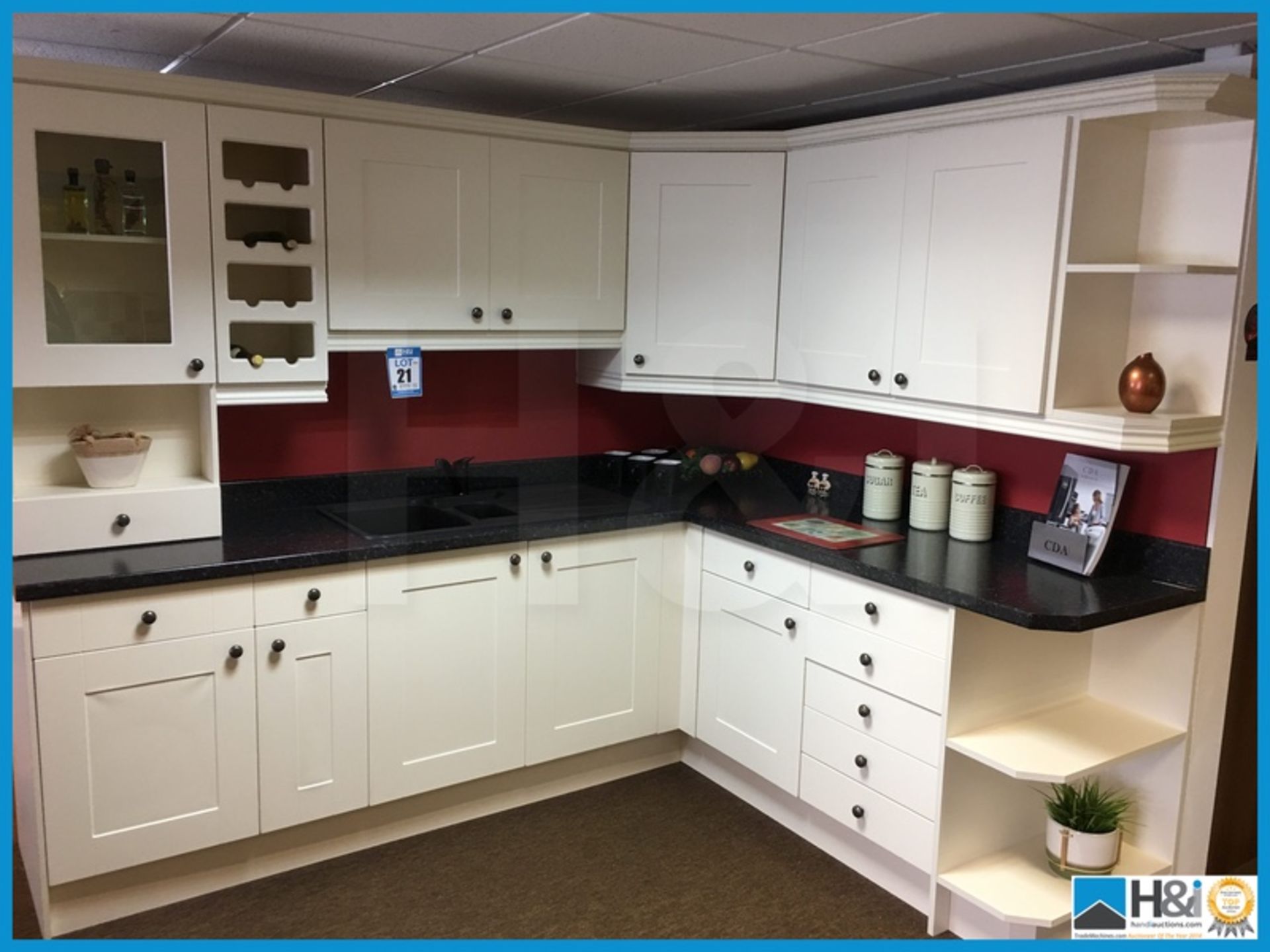 Beautiful white display kitchen compete with dark marble effect worktop, matching dark 1.5 bowl