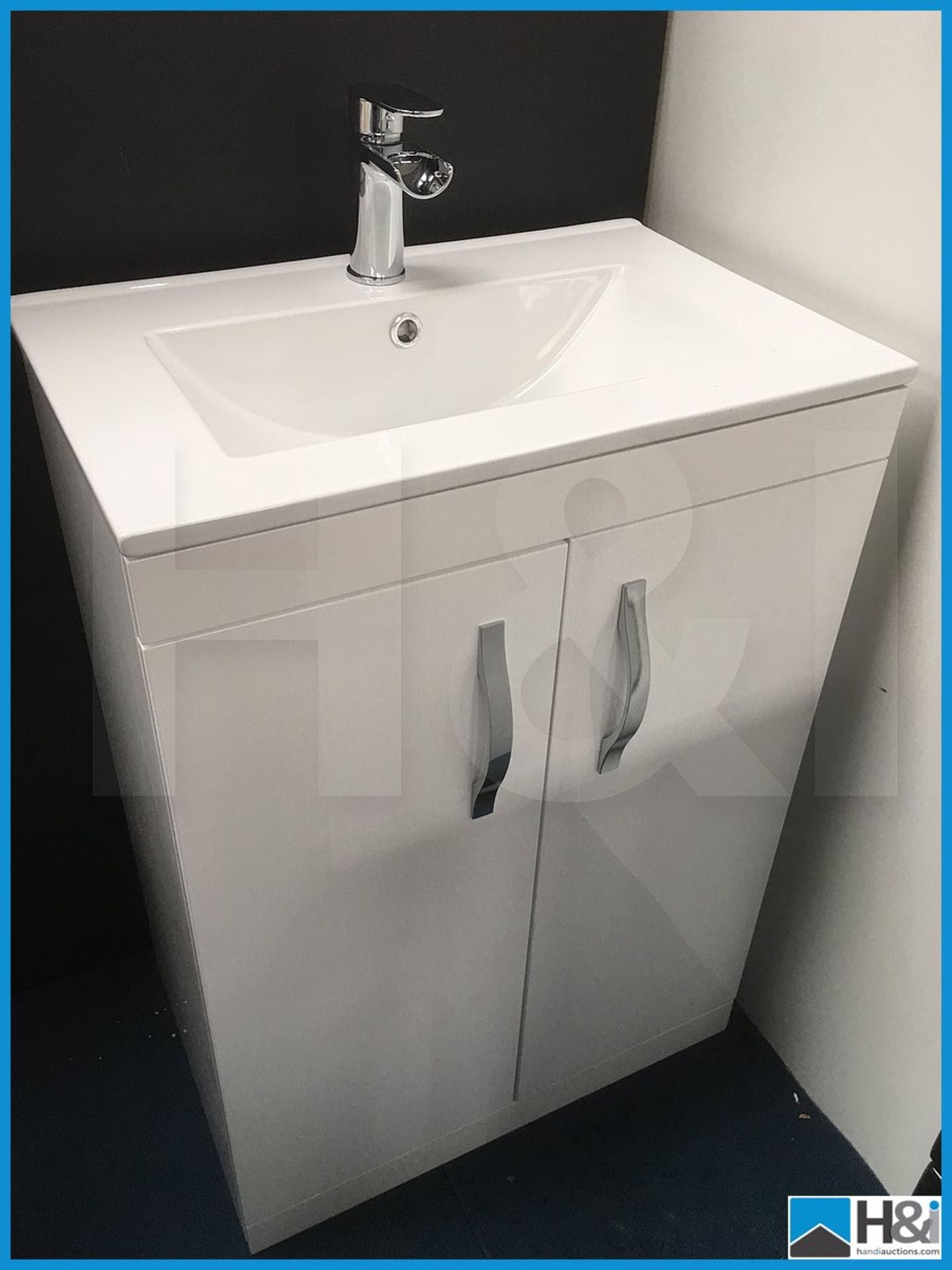 Beautiful contemporary gloss white 600x400 double door vanity unit with ceramic basin plus Ultra