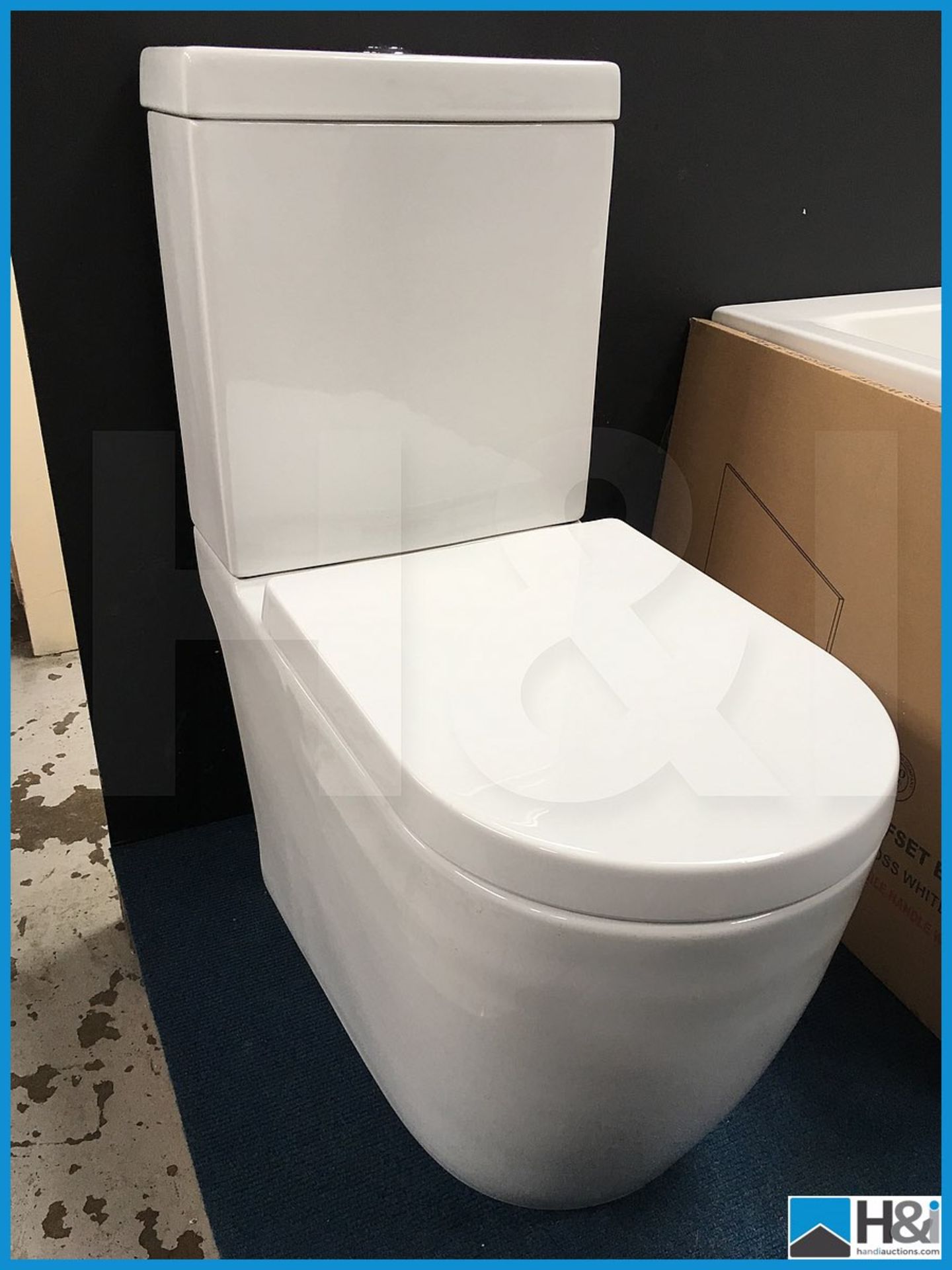 Stunning designer close couple Adam contemporary wc with soft close seat. New and boxed. Suggested