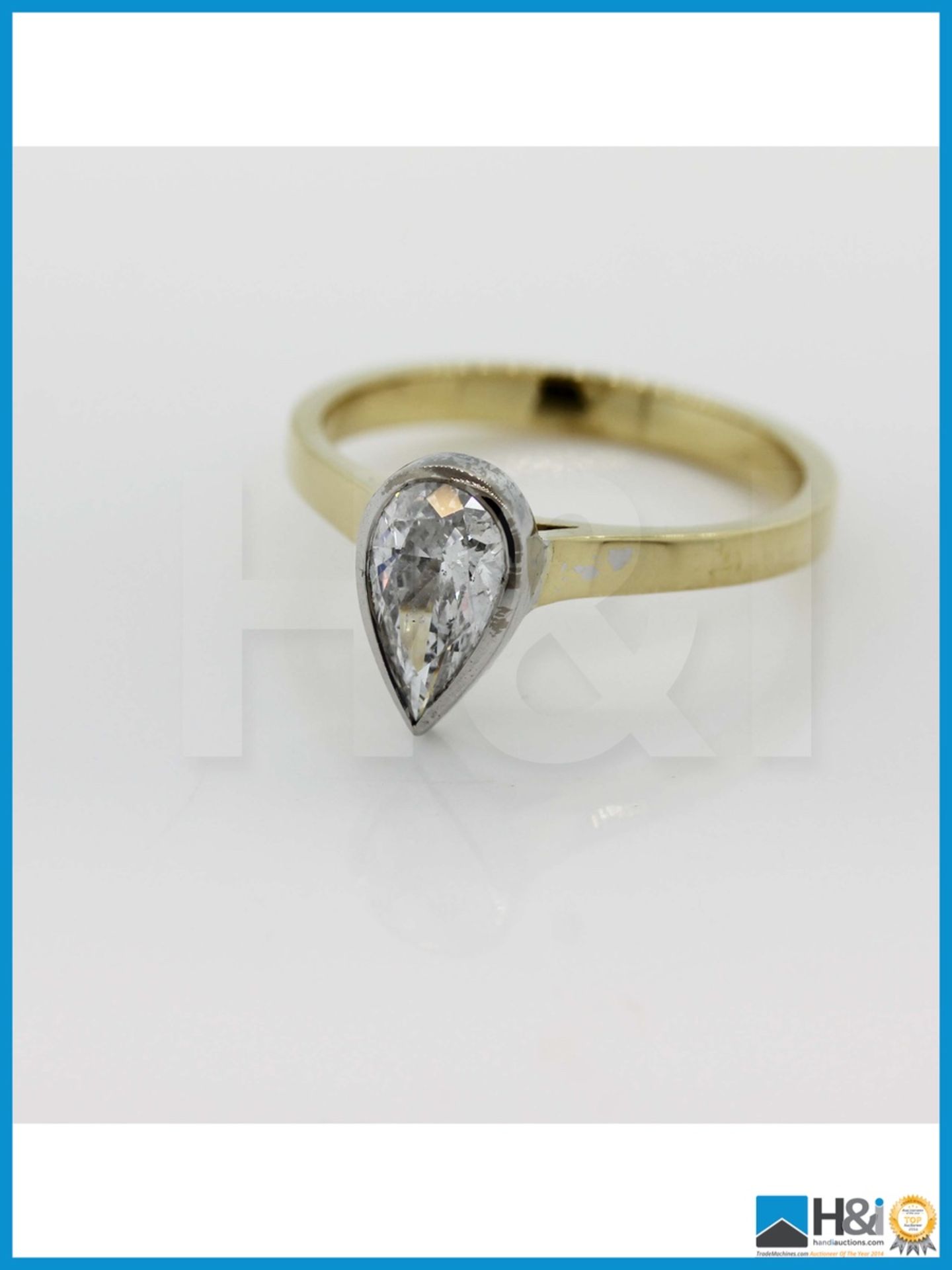 Ref: 11624. 18ct White And Yellow Gold Pear Shaped Diamond Solitaire Ring Set In A Rub Over