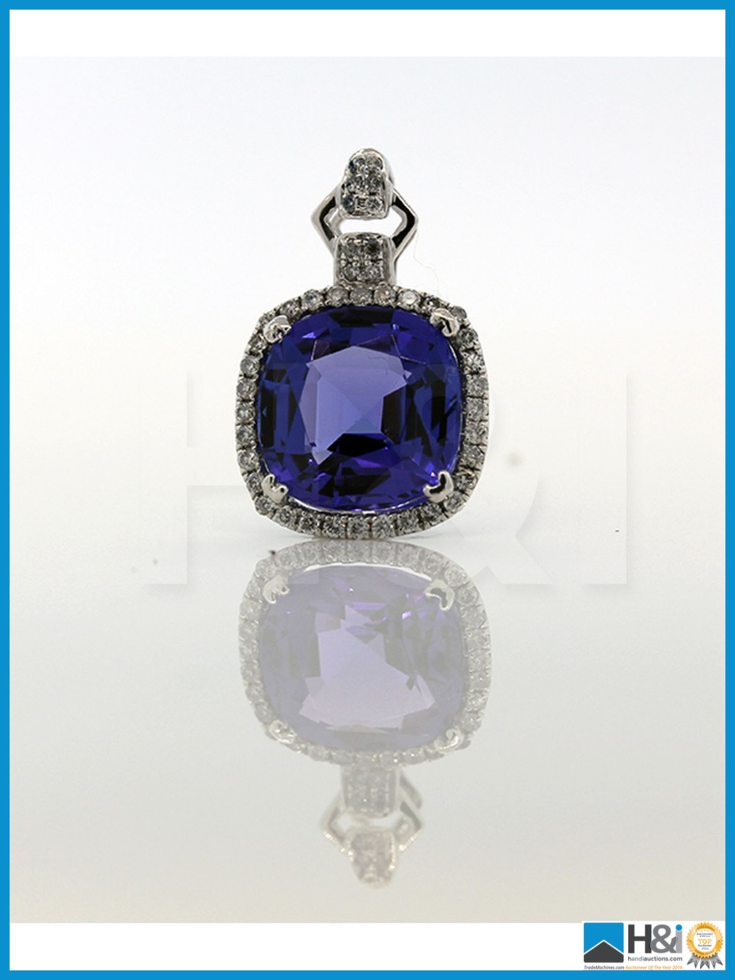 Ref: 11676. 18ct White Gold Tanzanite And Diamond Pendant Set With 4.28ct Cushion Cut Tanzanite With