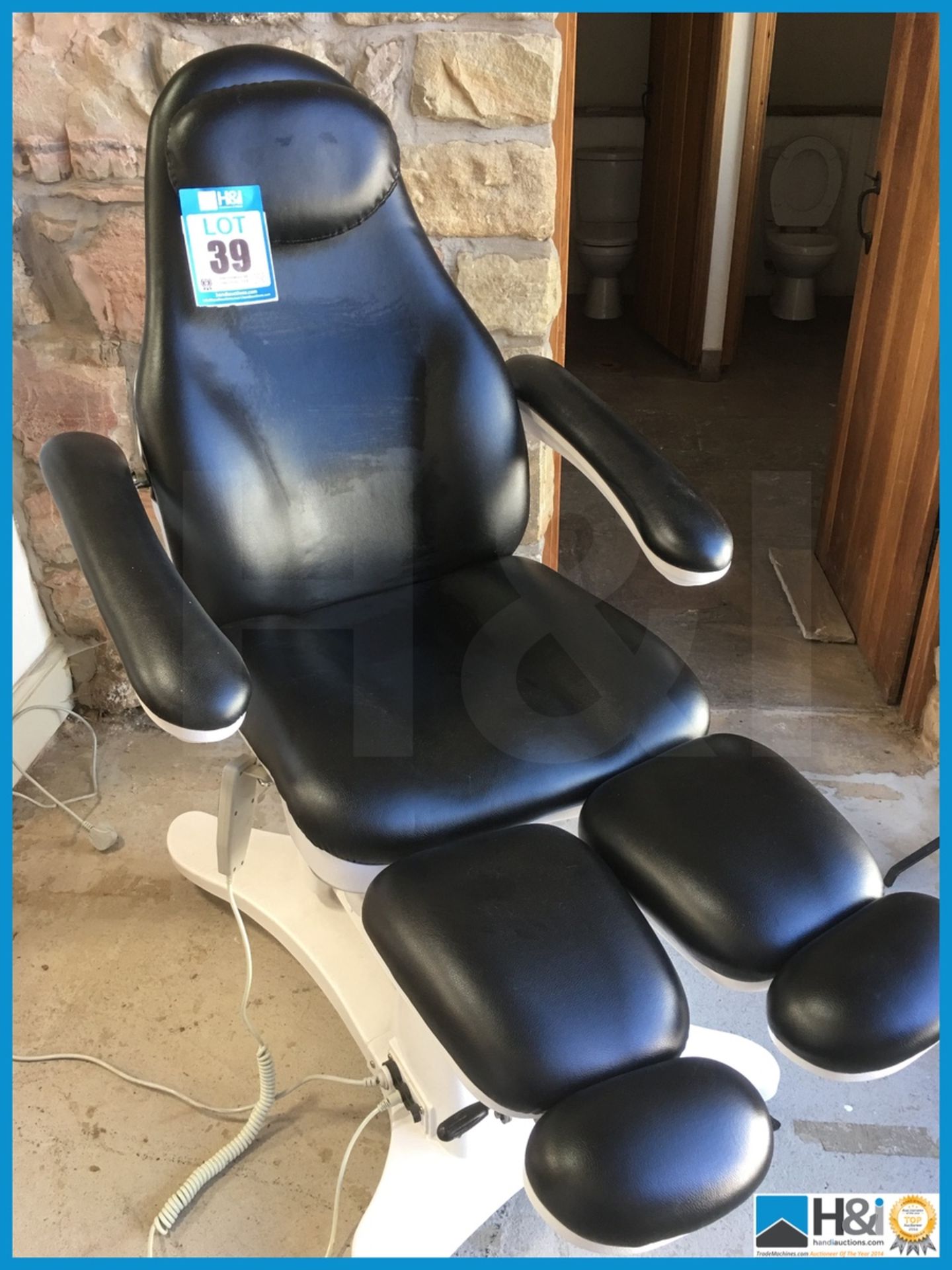 Ex display but in perfect condition electrically operated tattooist or therapist chair brand new