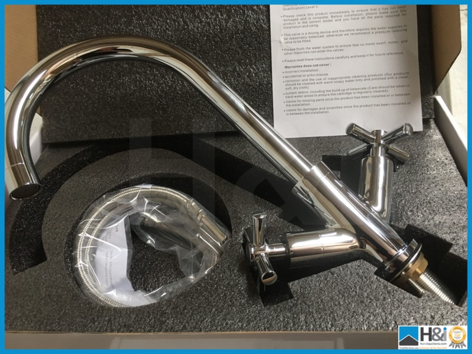 Designer polished chrome I77 kitchen mixer with cross heads. New and boxed. Suggested