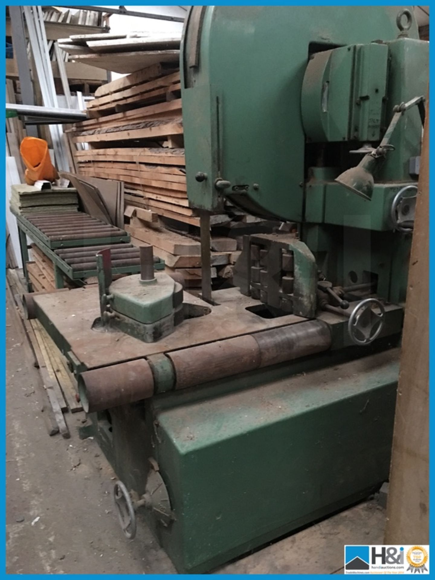 Robinson Band re saw with roller tables Appraisal: Viewing essential. Advised in working order