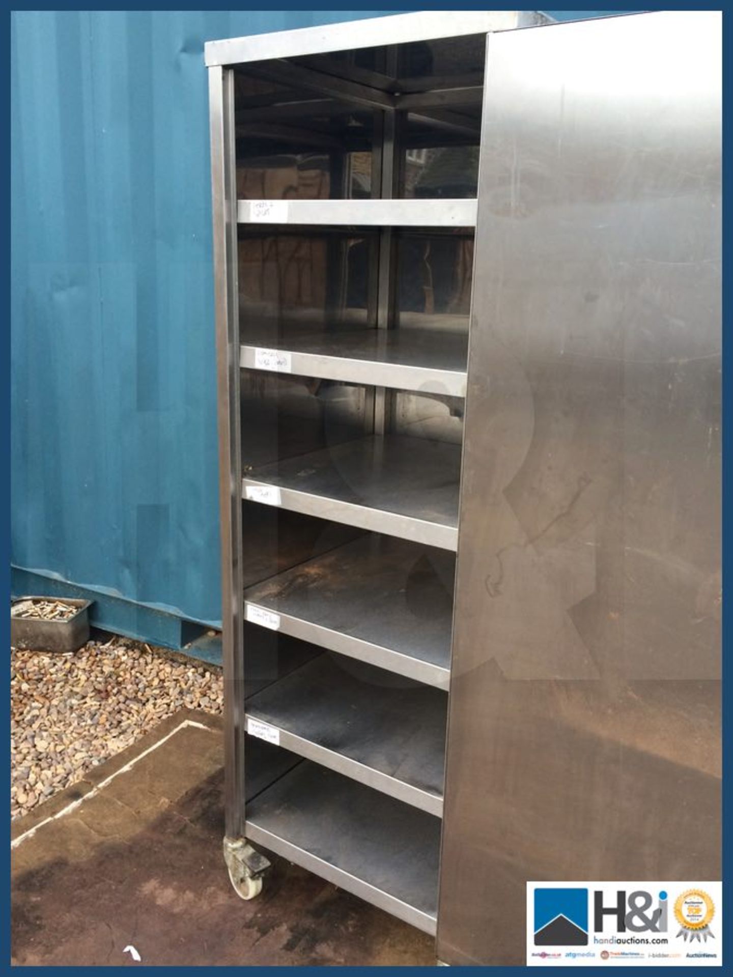 STAINLESS CUPBOARD ON CASTORS 5 SHELVES 600MM (W) 600MM (D) 1800MM (H) NEEDS LOCK BARREL REPLACING - Image 2 of 2