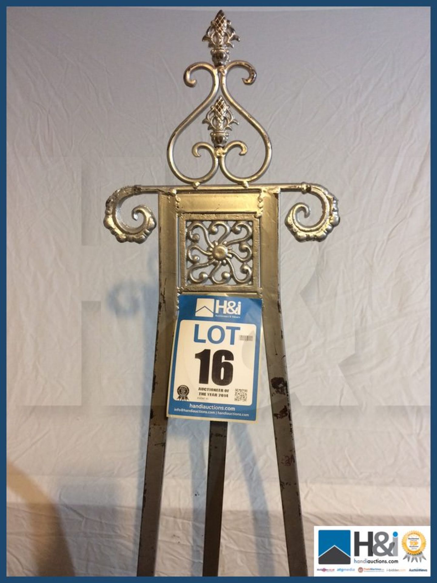 SILVER COLOURED METAL EASEL 1700 MM (H) Appraisal: Viewing Advised Serial No: NA Location: The