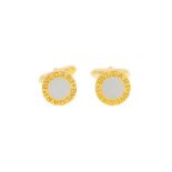 Bulgari- paire de boutons de manchette en or 750 et acier- signée- 10g /