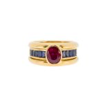 Bague en or 750 sertie d'un rubis taille ovale (env. 1 ct) et ses 3 anneaux interchangeables en or