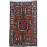 Tapis Kazakh Konakend- Caucase- 1ère moitié du XXe s.- orné d'un octogone central bleu et rouge