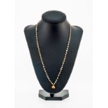 Collier XIXe s.- en or 750 serti de perles non testées- long. 49 cm