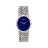 Piaget- montre-bracelet en or gris 750 et lapis lazuliSignée Piaget : cadran- boîte- mouvement-