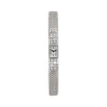 Montre Baguette en platine sertie de diamantsSignée Cartier sur le cadran- signée Ronda- n°EW8C- n°