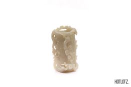 A CHINESE JADE NATURALISTIC TREE TRUNK VASE