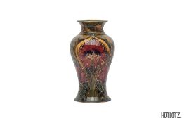 AN EARLY MOORCROFT 'CHRYSANTHEMUM' BALUSTER POTTERY VASE