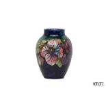 A MOORCROFT 'CLEMATIS' BULBOUS POTTERY VASE