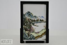 A CHINESE PORCELAIN PLAQUE