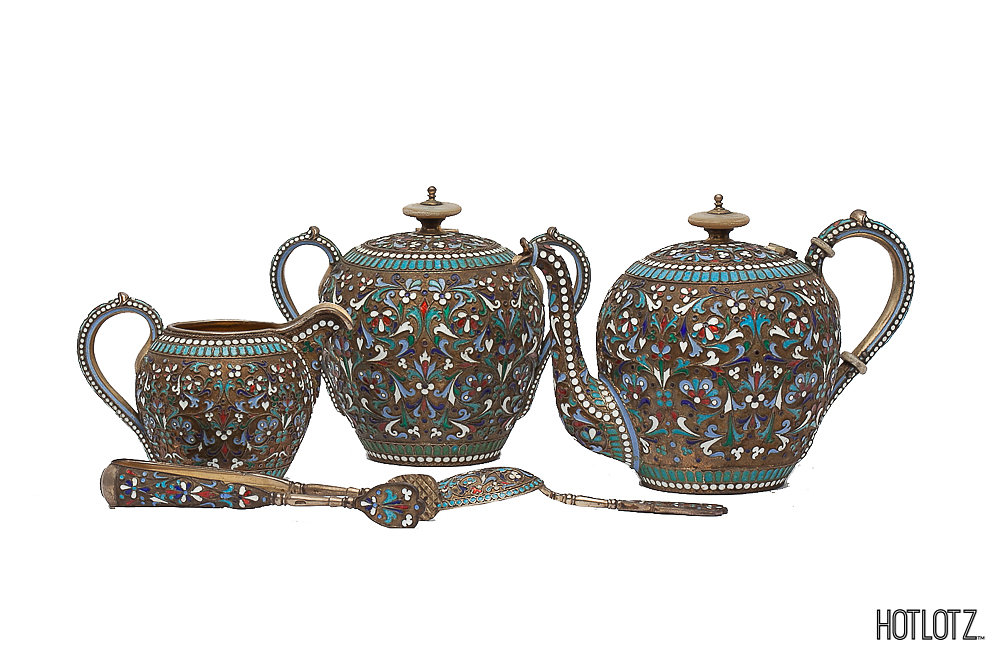 A RUSSIAN SILVER-GILT CLOISONNE ENAMEL FIVE PIECE TEA SERVICE.