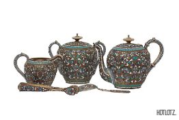 A RUSSIAN SILVER-GILT CLOISONNE ENAMEL FIVE PIECE TEA SERVICE.