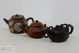 THREE CHINESE YIXING POTTERY TEAPOTS