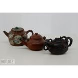 THREE CHINESE YIXING POTTERY TEAPOTS