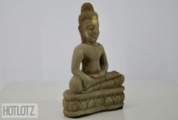 A SMALL STONE MODEL OF BUDDHA